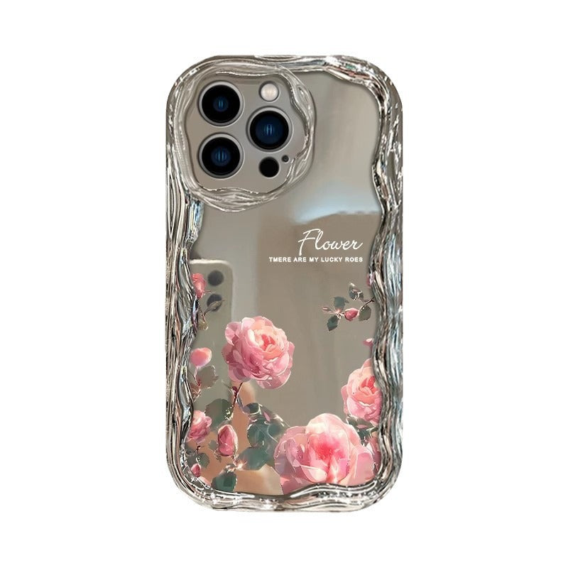 Clear iPhone case with pink rose design and wavy bumper edges.